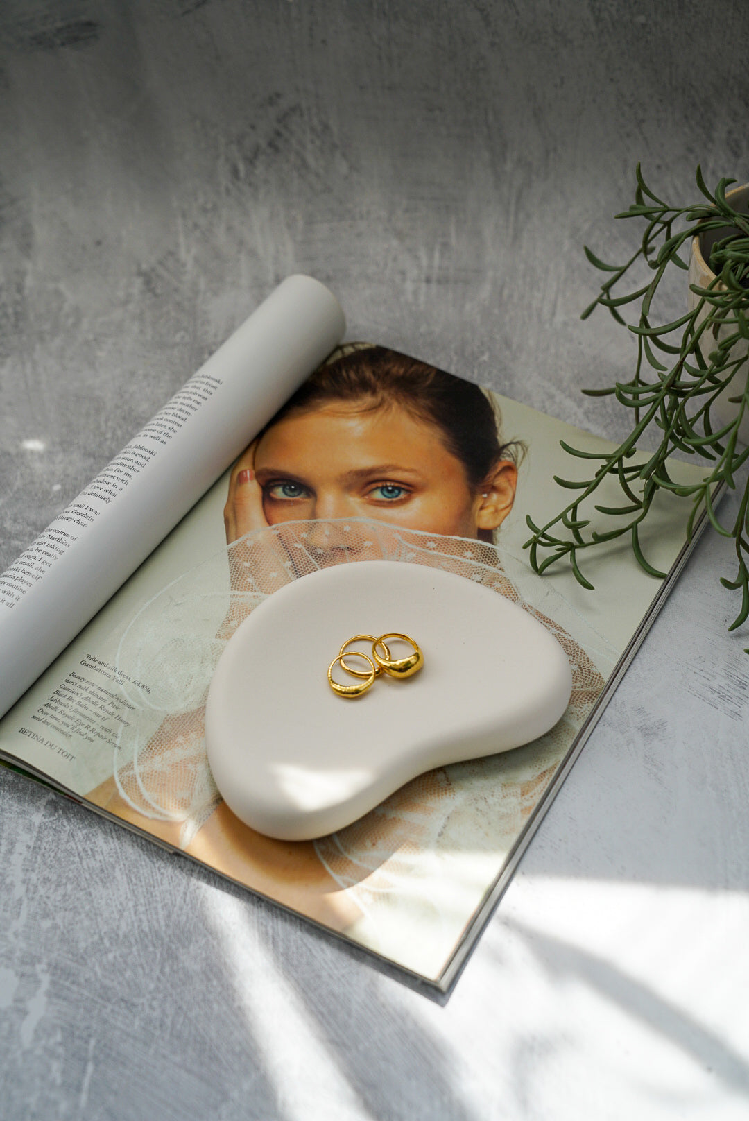 Irregular Jewellery Tray on a magazine.