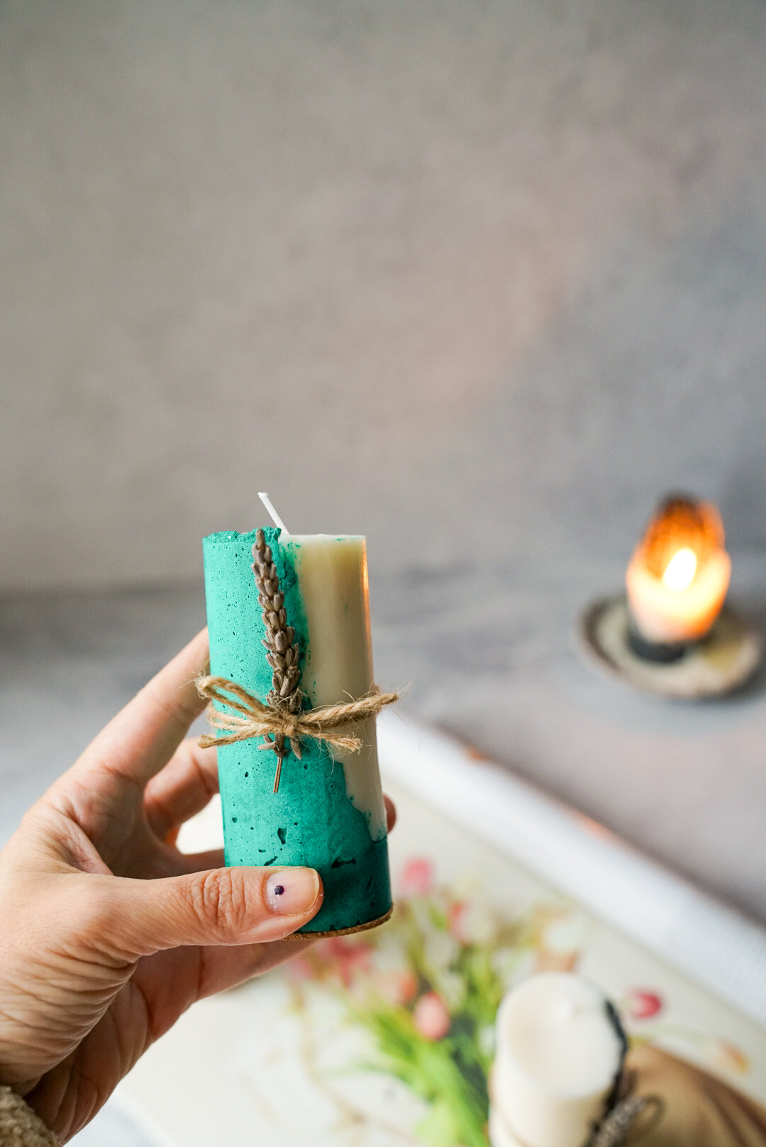 Holding Green Concrete Soy Wax Candles With Lavender Scented