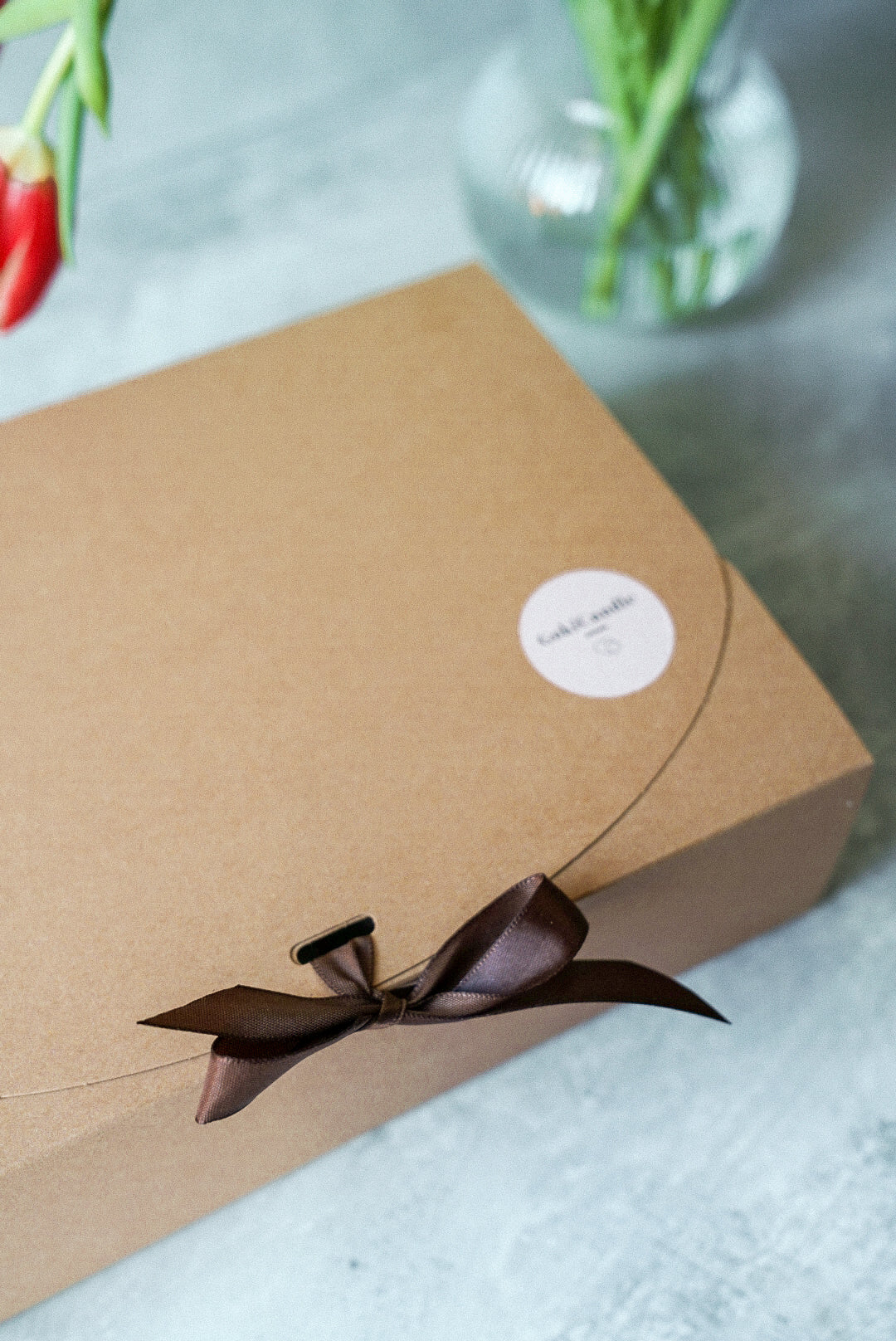 Brown gift box with brown bow