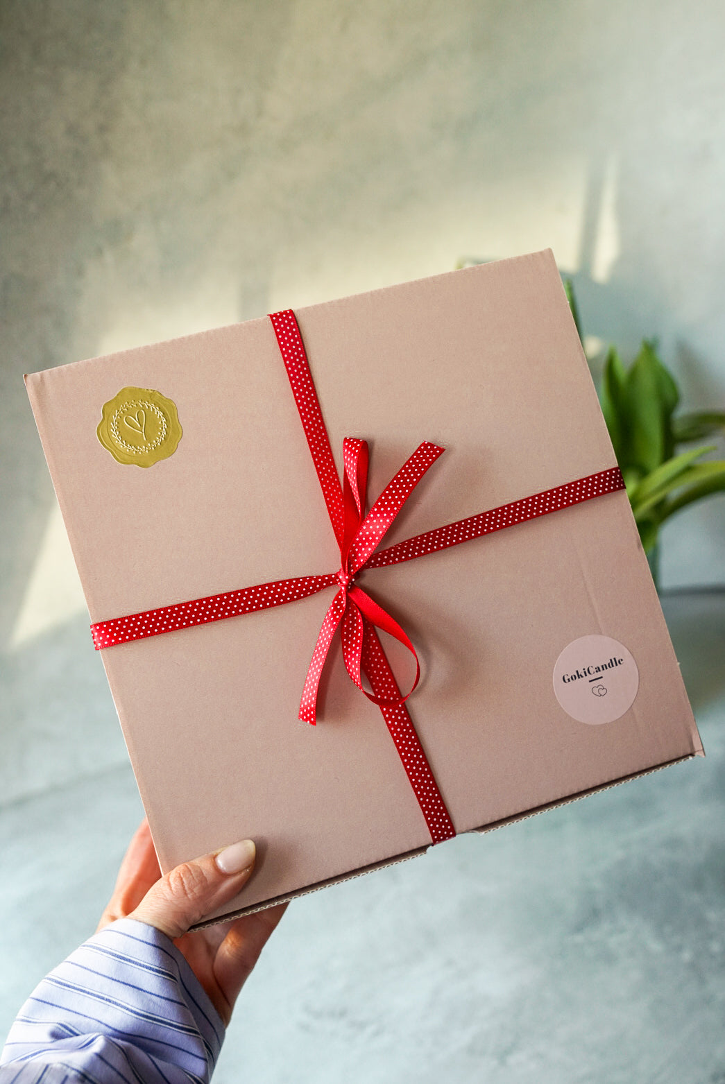 Holding the Pink gift box