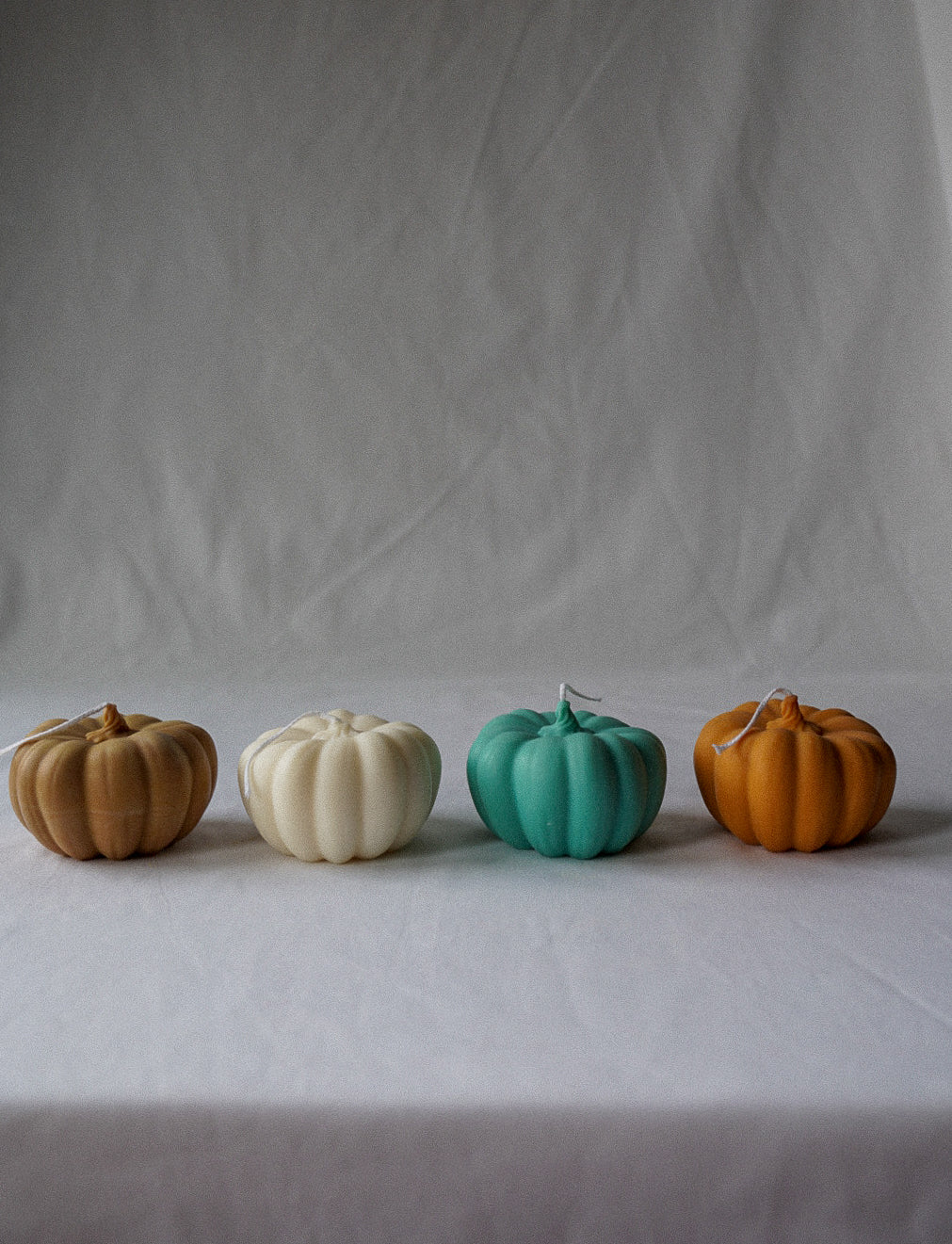 Halloween Pumpkin Candle with white background.