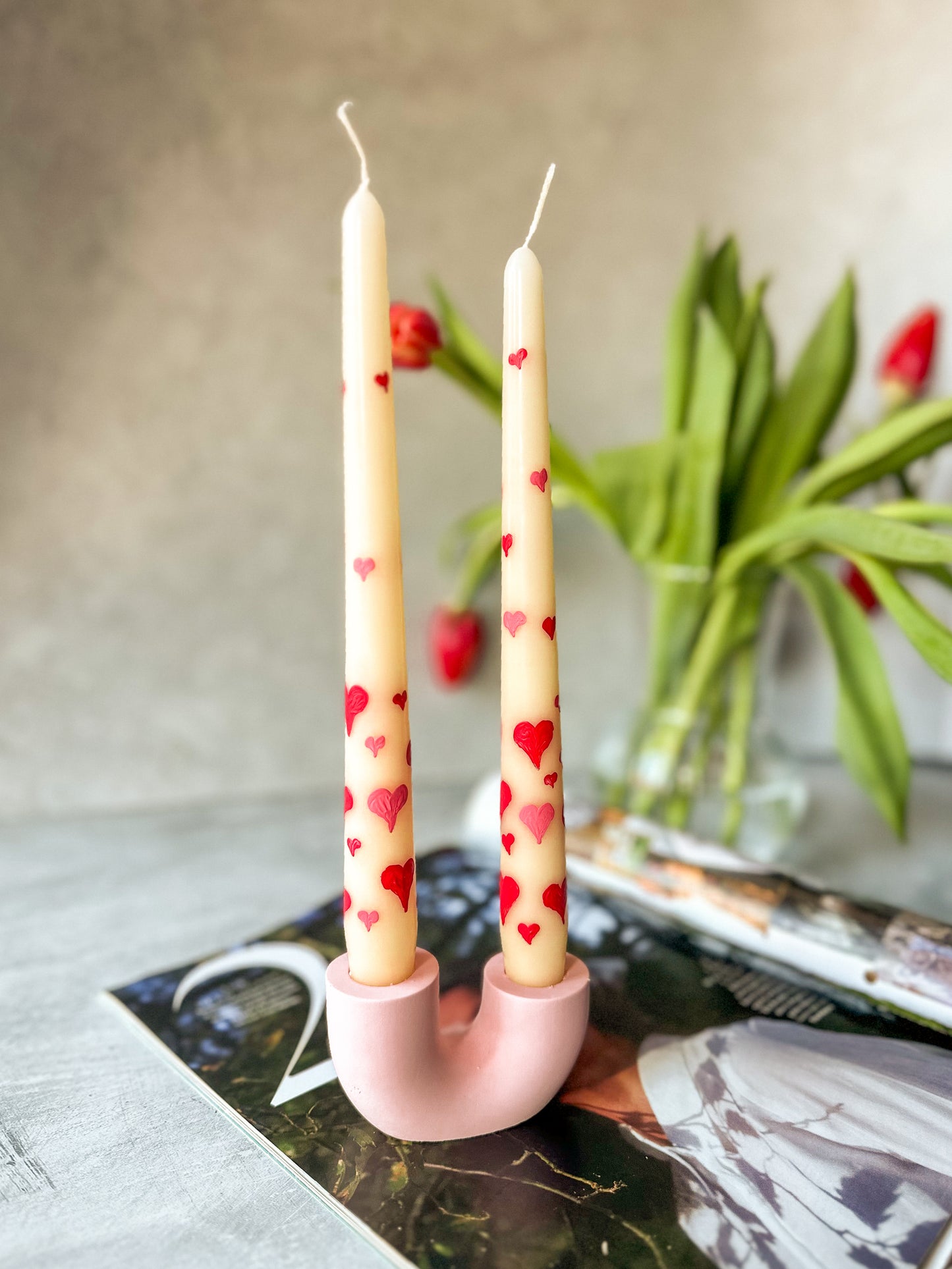 Heart Hand-Painted Pillar Candles with Pink U shape candle holder gift set on the magazine.