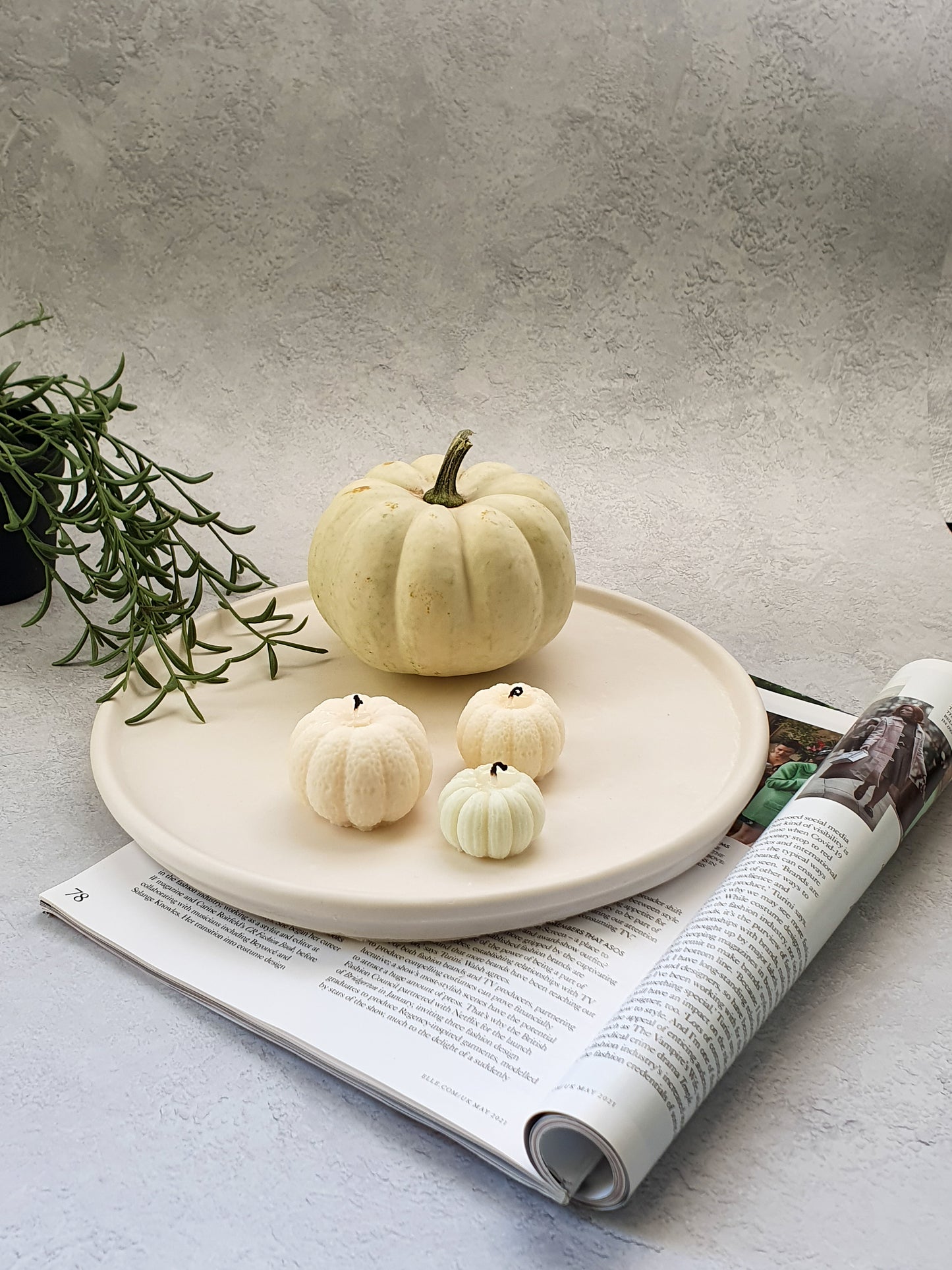 Large Round Decorative Tray with pumpkin and pumpkin candle on it