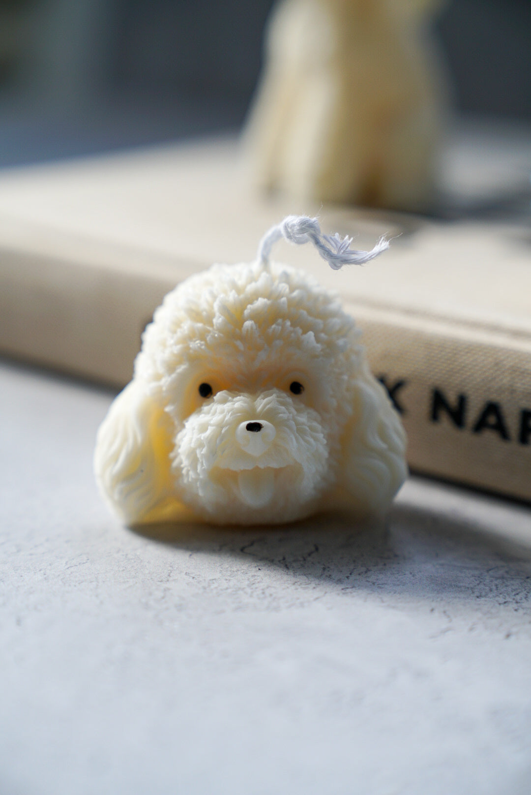 mini Bichon Puppy Dog Candle magazine on the back