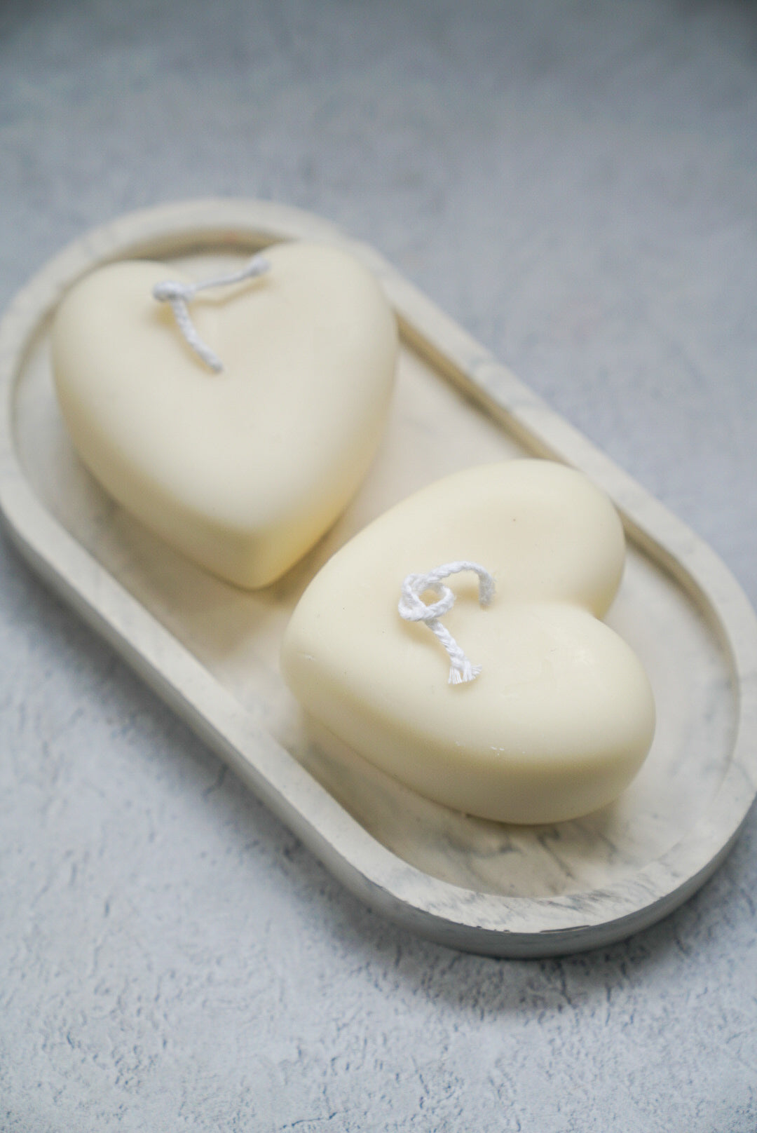 Heart-Shaped Candles on a trinket dish.