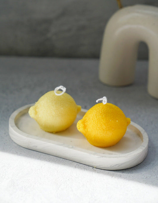 Lemon Shaped Candles on a trinket dish.