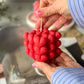 Holding Red Heart Cube Candle