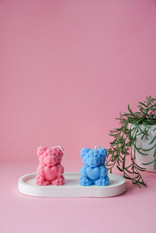 Mini Teddy Bear Holding Heart Candle with pink background