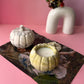 Minimalist pumpkin shaped candle