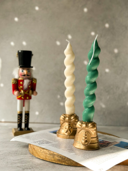 Christmas Candle Holders With Snowman details on it and Nutcracker on the back