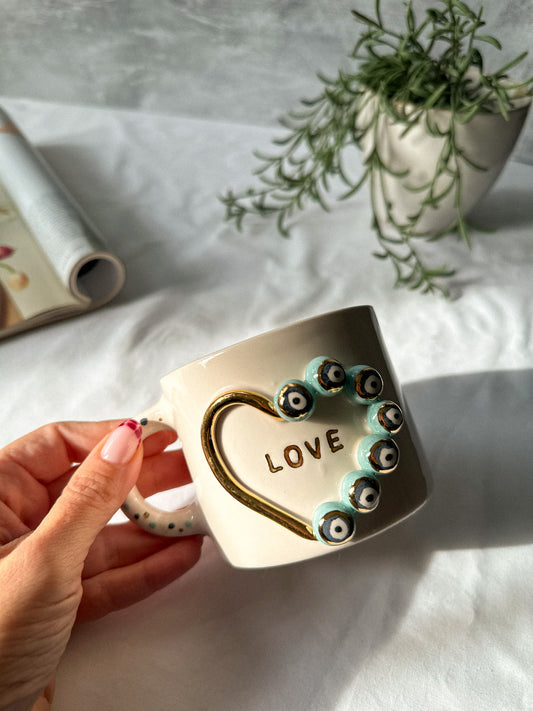 Holding a coffee mug on a white background