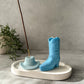 Baby blue  Cowboy Hat Incense Holder with incense in it sand blue cowboy boot sitting on a trinket dish.