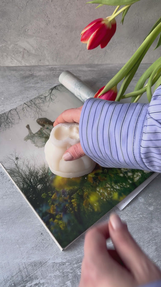 De-moulding video Hands Holding A Heart Candle