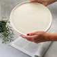 Holding Large Round Decorative Tray