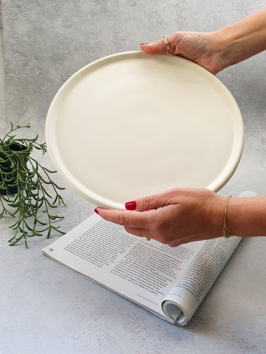 Holding Large Round Decorative Tray