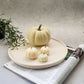 Large Round Decorative Tray with pumpkin and pumpkin candle on it