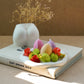 Easter Egg  Candles on a trinket dish with bottom shape vase on the background. 