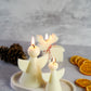 Christmas Angel Candles Set, on the back reindeer candles dry orange on the side.