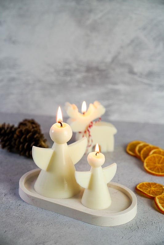 Christmas Angel Candles Set, on the back reindeer candles dry orange on the side.