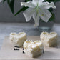 Ivory Heart Shape Sweetheart Cake Candle flowers on the back.