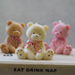 Three Cute Teddy Bear Candle with red and white ribbon on