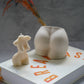 Concrete Booty Decorative Vase and naked lady body. both on the book with a grey background. 