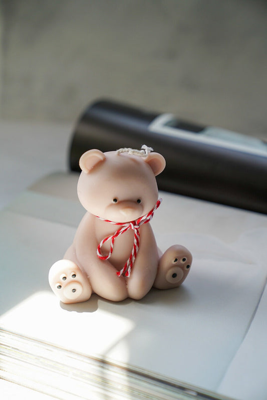 Cute Teddy Bear Candle with red and white ribbon on