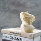 Half David Head Statue Candle from the back.